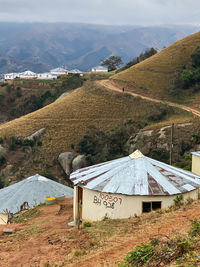 Scenic view of landscape and mountains against sky