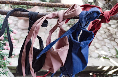 Close-up of clothes drying on rope