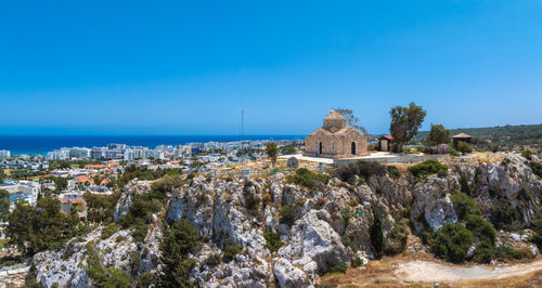 Scenic view of sea against clear blue sky