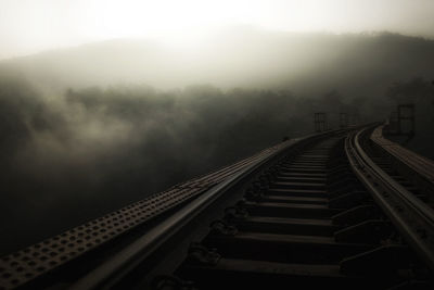 Railroad tracks in foggy weather