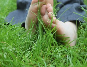 Low section of man in grass