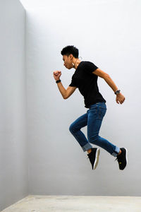 Full length of man jumping