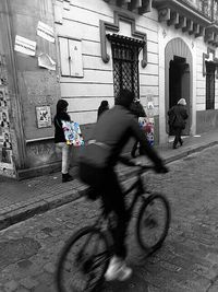 Full length of woman standing in city