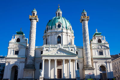 Low angle view of building against blue sky