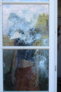 Close-up of broken window