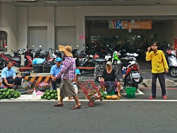 Full length of people in shopping mall