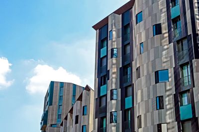 Low angle view of modern building against sky