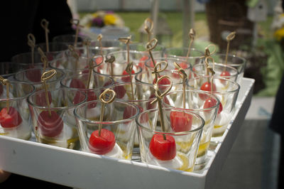 Caprese salad with skewers in glasses