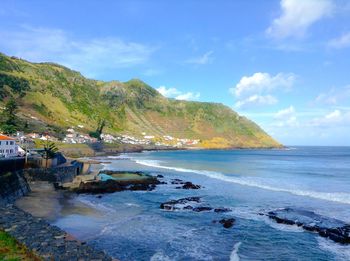 Scenic view of beach against sky
