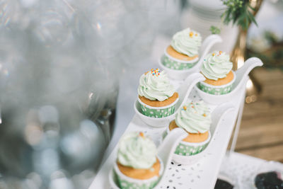 High angle view of cupcakes on table