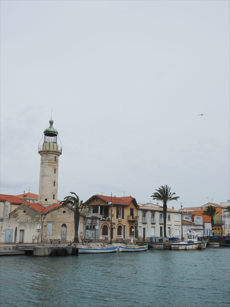 water, building exterior, built structure, architecture, sky, building, waterfront, nature, travel, no people, day, travel destinations, copy space, sea, transportation, religion, city, outdoors, mode of transportation, canal