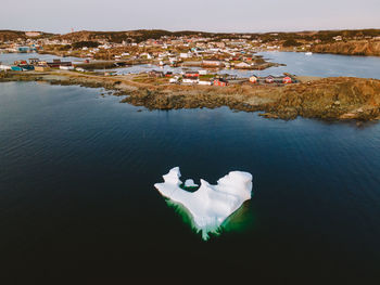 Iceberg at dusk in spring in twillingate, newfoundland, canada