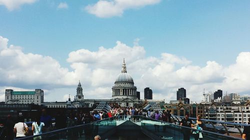 View of buildings against cloudy sky