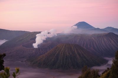 View of volcanic mountains during sunrise