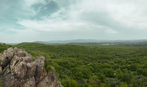 Scenic view of land against sky