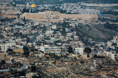 Sunset casts a warm glow on the ancient jerusalem wall, revealing its timeless beauty 