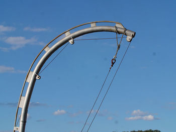 Low angle view of street light against sky