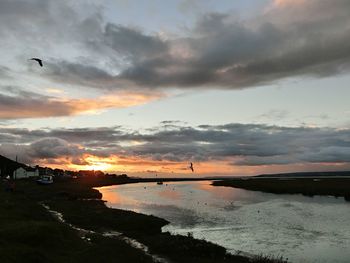 Scenic view of sea during sunset