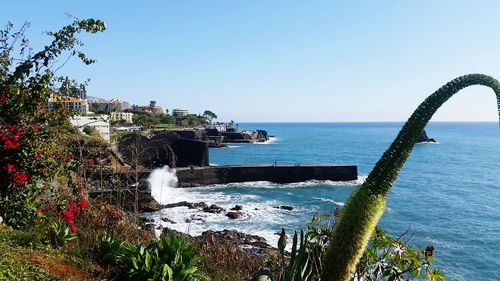 Scenic view of sea against clear sky