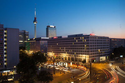 View of city buildings at night