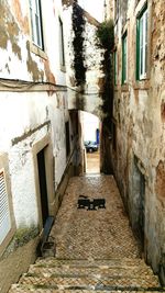 Narrow alley along buildings