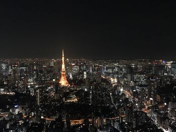 Illuminated buildings in city at night