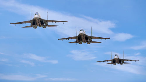 Squadron of sukhoi su30 mk2 fly by atc tower during demonstration