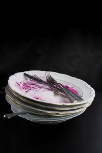Close-up of ice cream over black background
