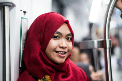 Close-up portrait of smiling woman