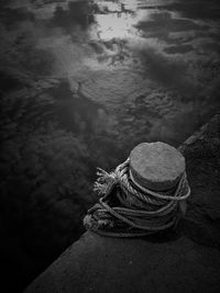 Close-up of rope tied on rock