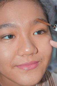 Close-up portrait of a beautiful young woman