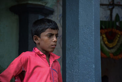 Portrait of young man looking away