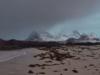 Scenic view of snowcapped mountains against sky