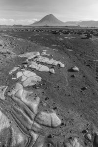 Aerial view of desert land against sky