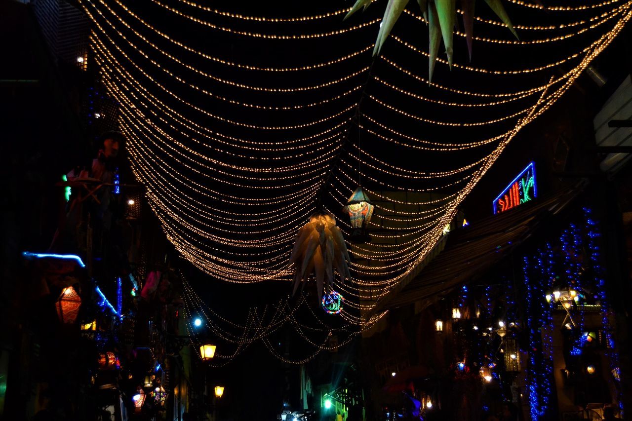 night, illuminated, low angle view, outdoors, hanging, architecture, building exterior, no people, city, close-up, sky