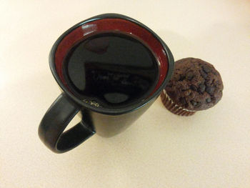 Close-up of coffee cup on table