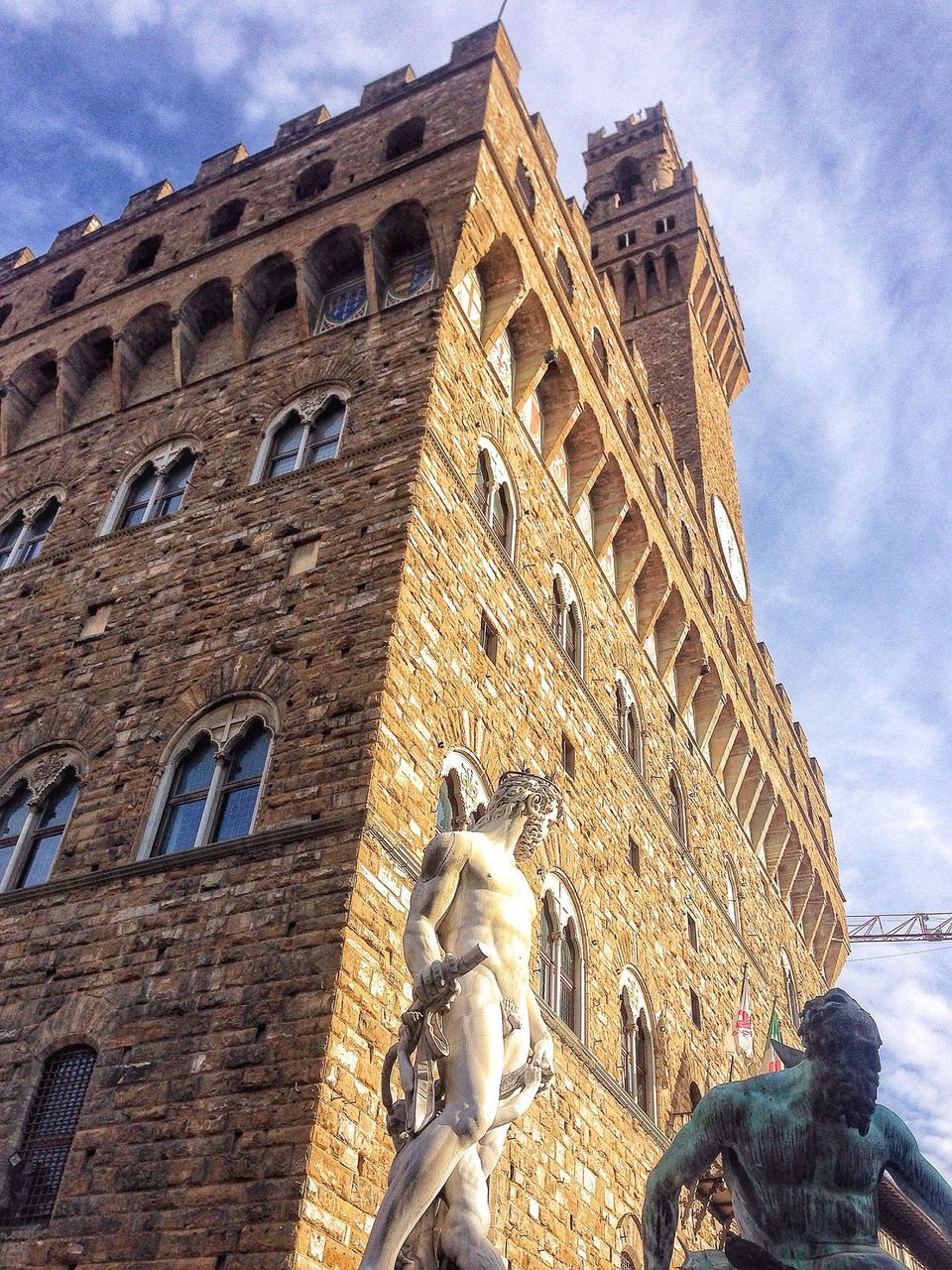 architecture, built structure, building exterior, sky, low angle view, history, sculpture, art and craft, human representation, statue, art, cloud - sky, famous place, creativity, travel destinations, the past, tourism, cloud, international landmark