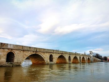 Old bridge over river