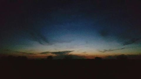 Scenic view of landscape at sunset