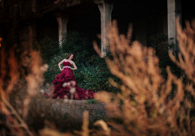 Woman sitting in a garden