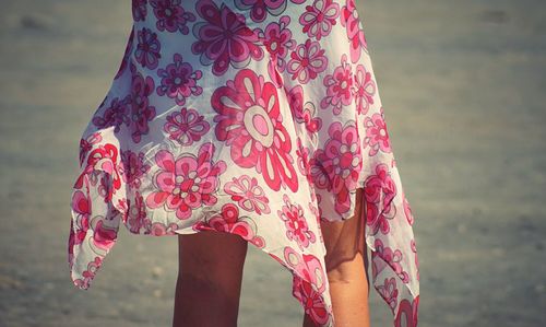 Rear view of woman at beach