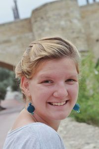 Close-up portrait of smiling woman