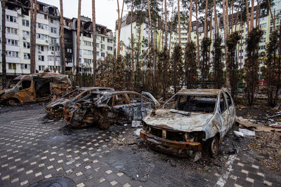 Shot cars. on the streets of irpin. cities of ukraine after the russian occupation. irpin, bucha,