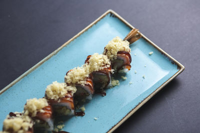 High angle view of sushi in plate on table