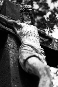 Low angle view of statue against sky