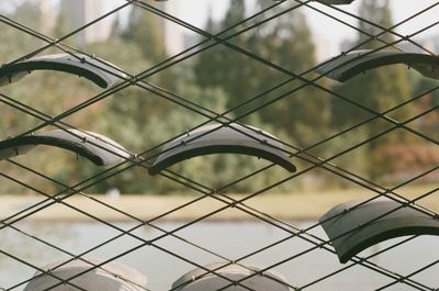 Full frame shot of chainlink fence against sky