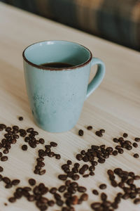 High angle view of coffee cup on table