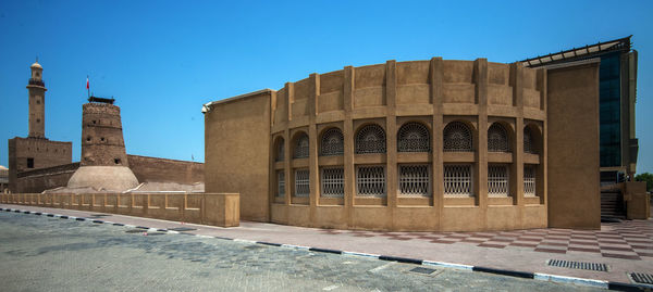 Heritage building against clear blue sky