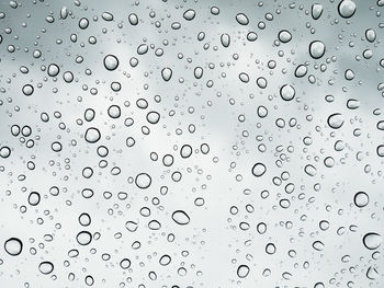 Selective focus water drops on the windshield after rain.