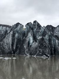 Scenic view of glacier containing ashes 